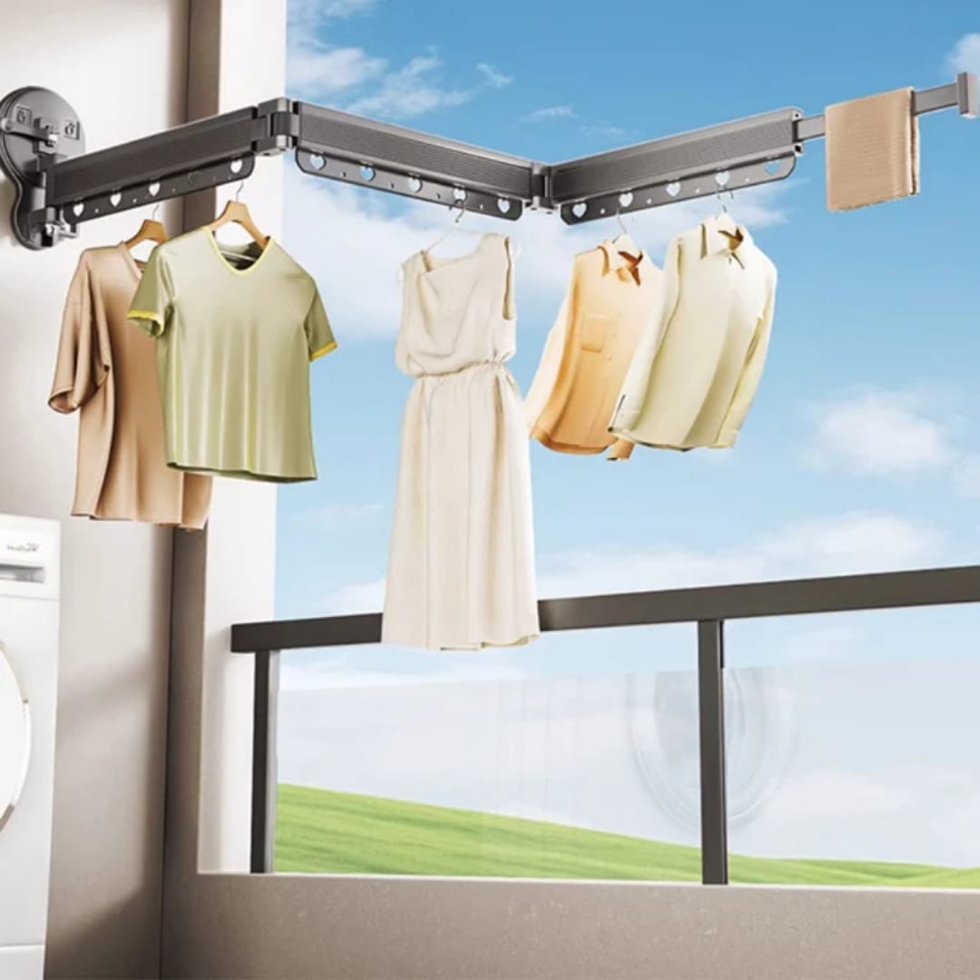 Retractable wall-mounted clothes drying rack with suction cups for portable and space-saving laundry drying
