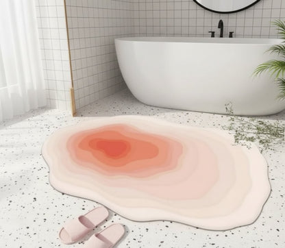 Absorbent irregular bathroom mat measuring 40 × 60 cm