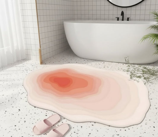 Absorbent irregular bathroom mat measuring 40 × 60 cm