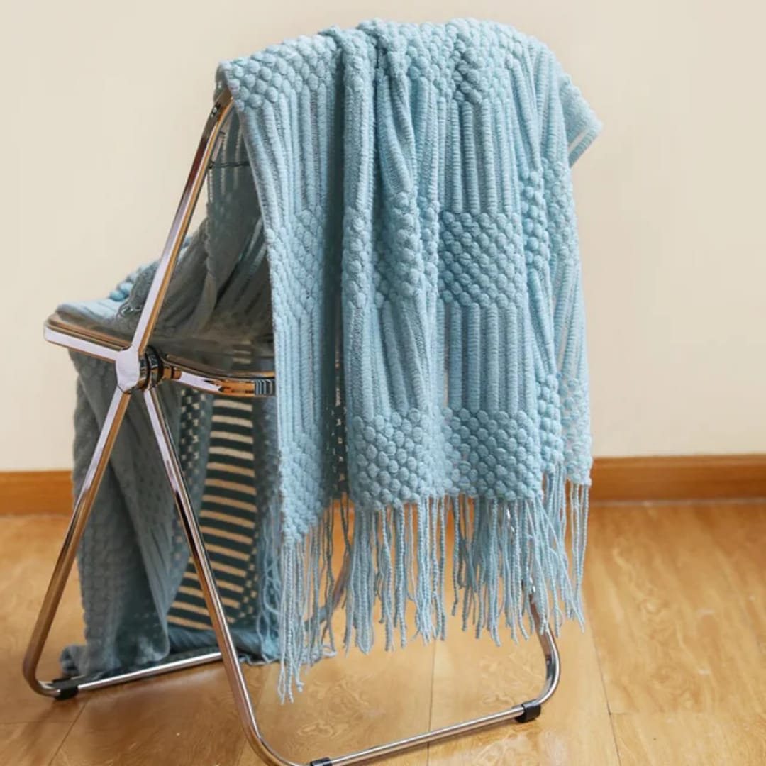 Soft knitted throw blanket with tassels for cozy modern home décor