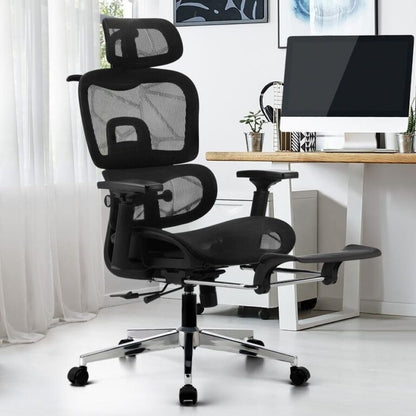 Executive ergonomic office chair with adjustable footrest and padded support.