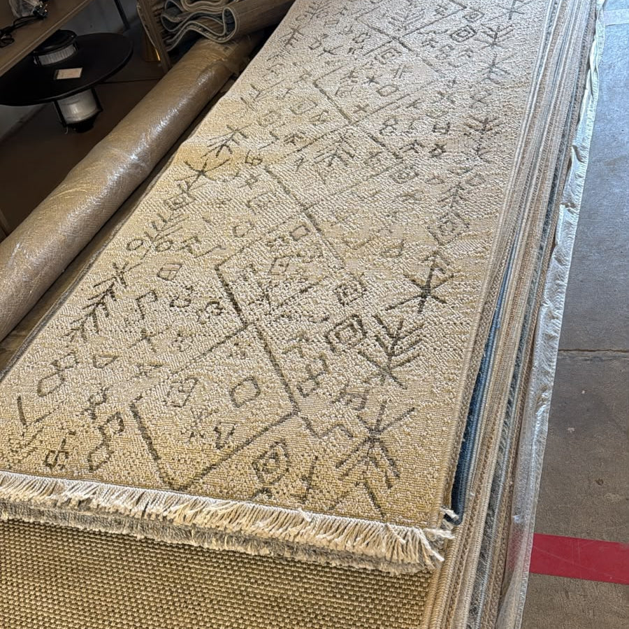 Dawood Lifestyle & Gadgets ke Oriental Weavers Kemet #5 beige Moroccan tribal corridor runner rug with black Berber symbols, jute-look texture and fringe