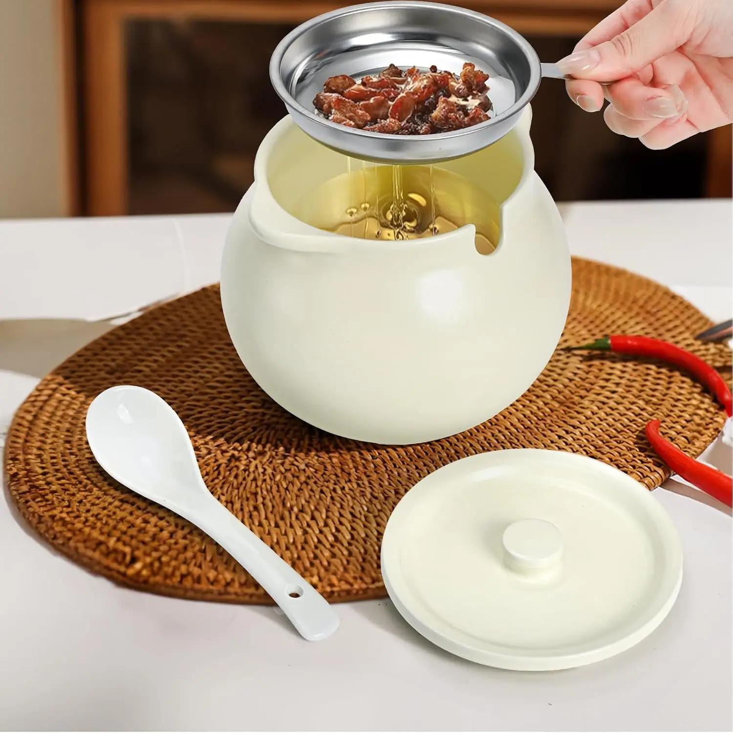 1400 ml ceramic oil storage jar with scoop and heat resistant design for organized kitchen countertop storage.