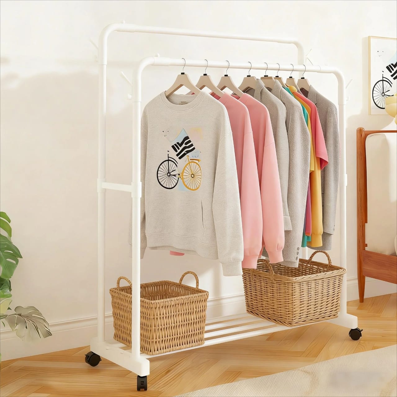 Double pole clothing rack with wheels and lower storage shelf metal garment organiser 110x40x150cm available in black and white for clothes shoes boxes and bedroom storage.