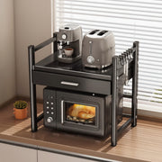 Black heavy-duty microwave stand with extra storage drawer and rust-resistant carbon steel construction.