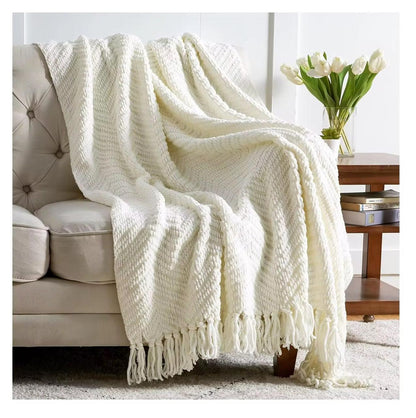 Textured knitted heavy throw blanket with tassels in white, rust, and light grey, size 