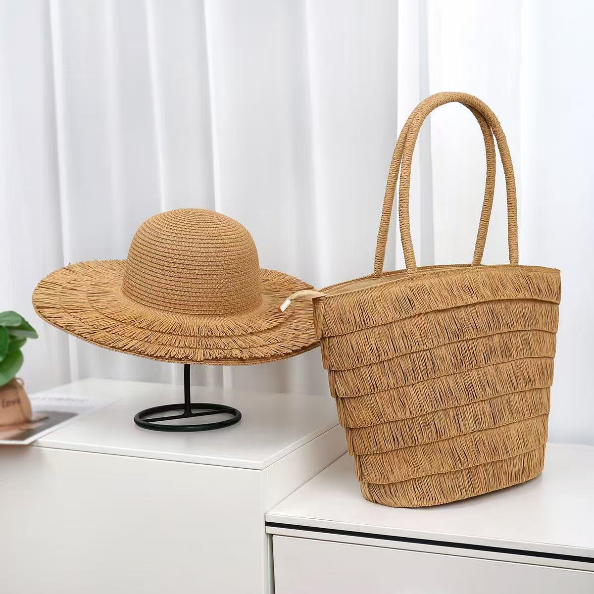 Summer straw woven beach bag and matching hat set with chic design and zipper closure.