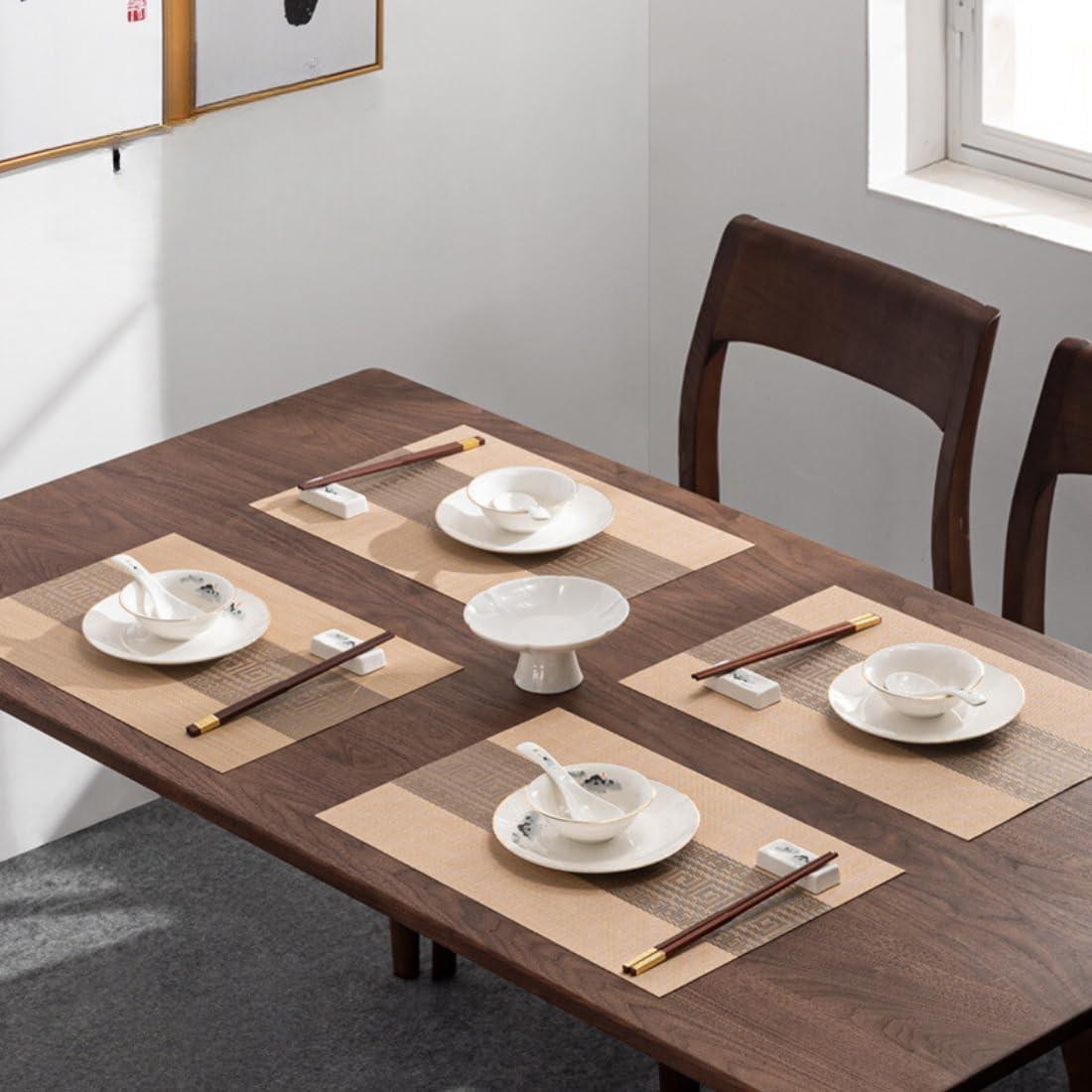 Set of 4 stylish table mats arranged on a dining table