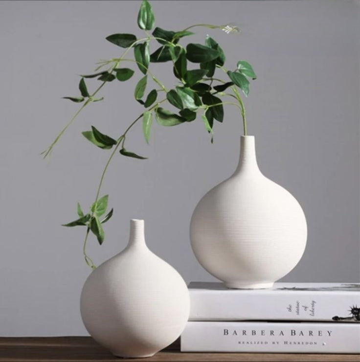 Small trumpet-shaped ceramic vase with matte brushed finish