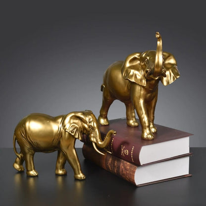 Golden Elephant Figurine With Raised Trunk