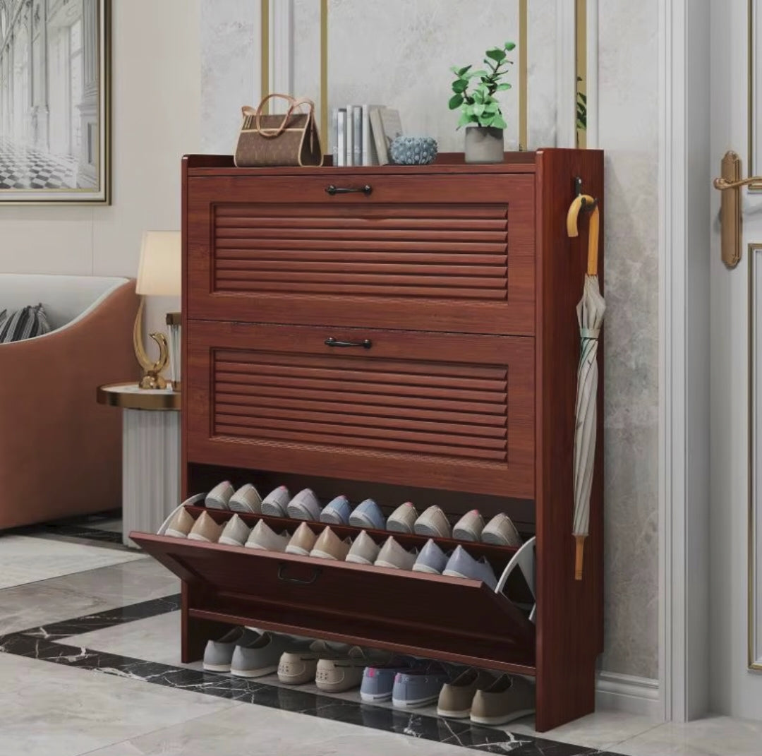 Ultra-thin flip shoe cabinet with white finish and black details for space-saving shoe storage in narrow entryways, hallways, and compact living spaces