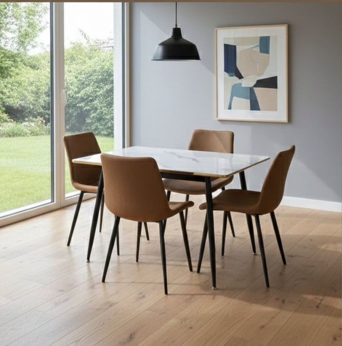 Four-seater marble dining table with microfiber chairs and metallic black legs with gold finish