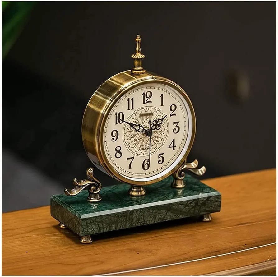 European antique style clock with marble base and decorative details