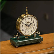 European antique style clock with marble base and decorative details