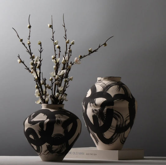 Artistic vase set of 2 pieces with bold patterns for modern statement corner home décor. 