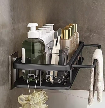 Black metallic bathroom sink caddy with strong adhesive stickers for organizing toiletries.