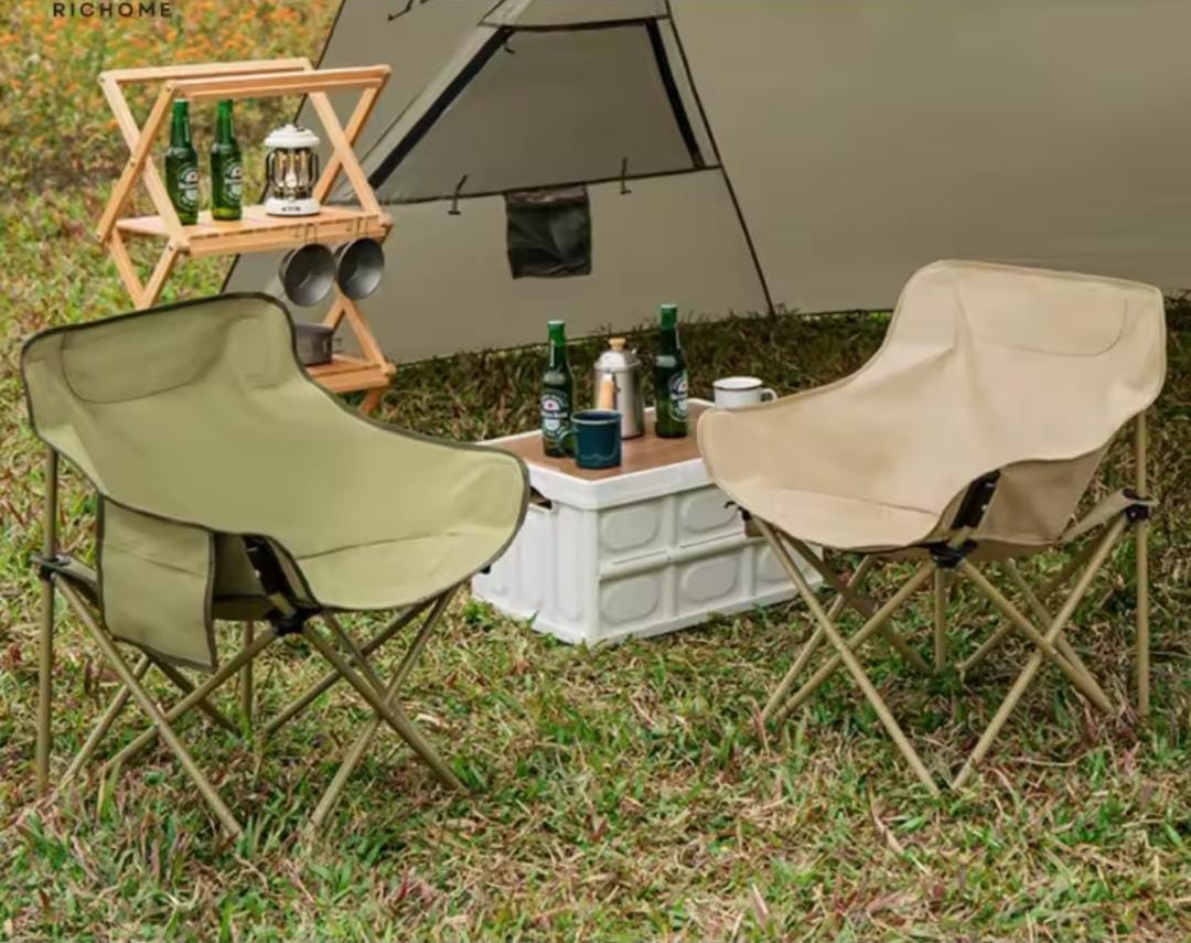 Portable foldable camping moon chair with carry bag.