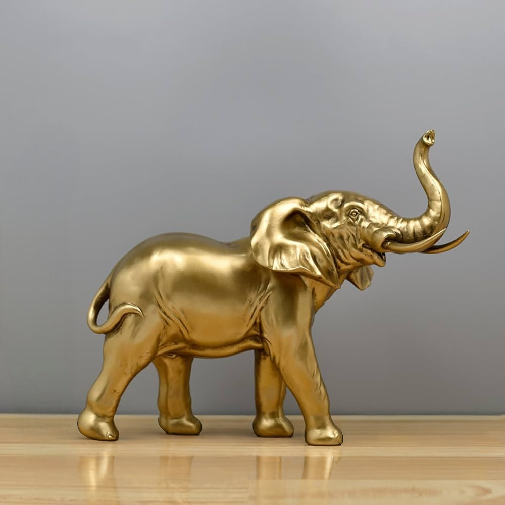 Golden Elephant Figurine With Raised Trunk