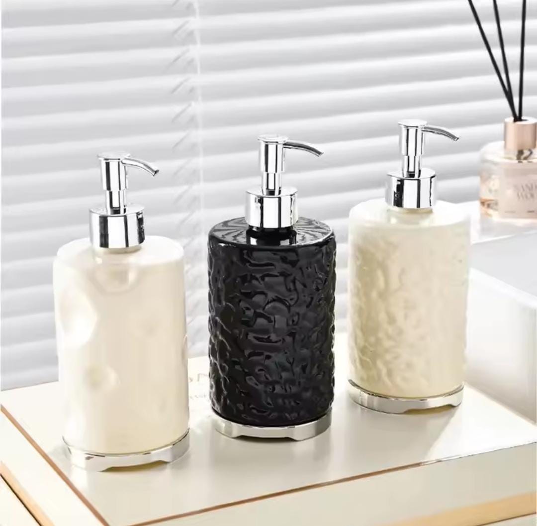Round 500ml acrylic coloured handwash dispenser.