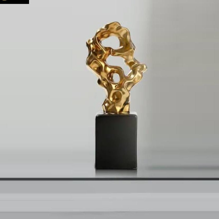 Artistic style ceramic décor ornament with modern elegant design for home and office interiors.