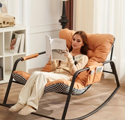 Orange tufted cushion rocking chair designed for comfort and stylish seating in balconies, patios, and living rooms