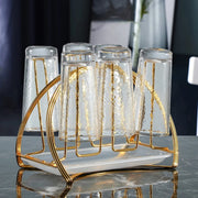 Glass water cup drying rack with spinning drainboard
