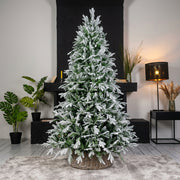 Dark Green Pine and PVC Snow Flocked Christmas Tree with 3000 Leaves for Indoor Festive Decorations available in Nairobi, Kenya