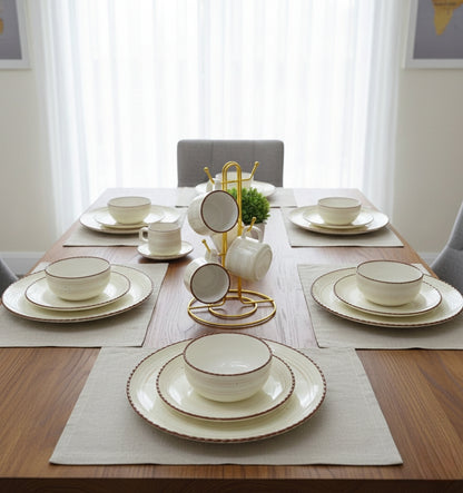 36-piece European porcelain dinner set with plates, bowls, mugs, and saucers