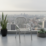 Compact balcony and garden chair with ergonomic seating design suitable for outdoor and indoor use in modern home spaces.