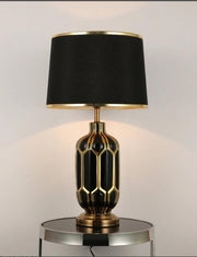 Ceramic table lamp with elegant base for bedroom, living room, or office lighting