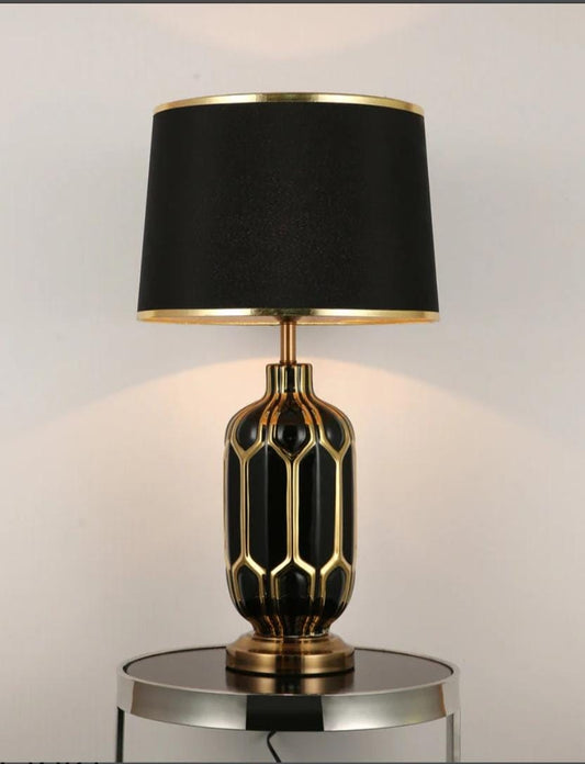 Ceramic table lamp with elegant base for bedroom, living room, or office lighting