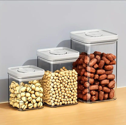 Three-piece airtight press-to-seal food storage containers with lids for kitchen organization.