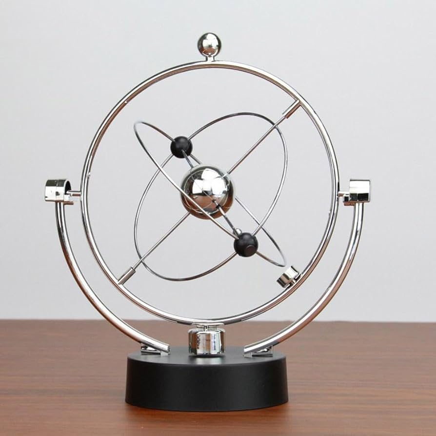 Newton pendulum cradle for office desk décor, demonstrating motion and momentum, sleek and modern design. 