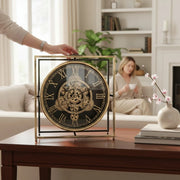 Mantle gear clock with exposed mechanical gears, vintage-style timepiece for home or office décor.