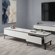 White TV stand with shelves for TV and media storage