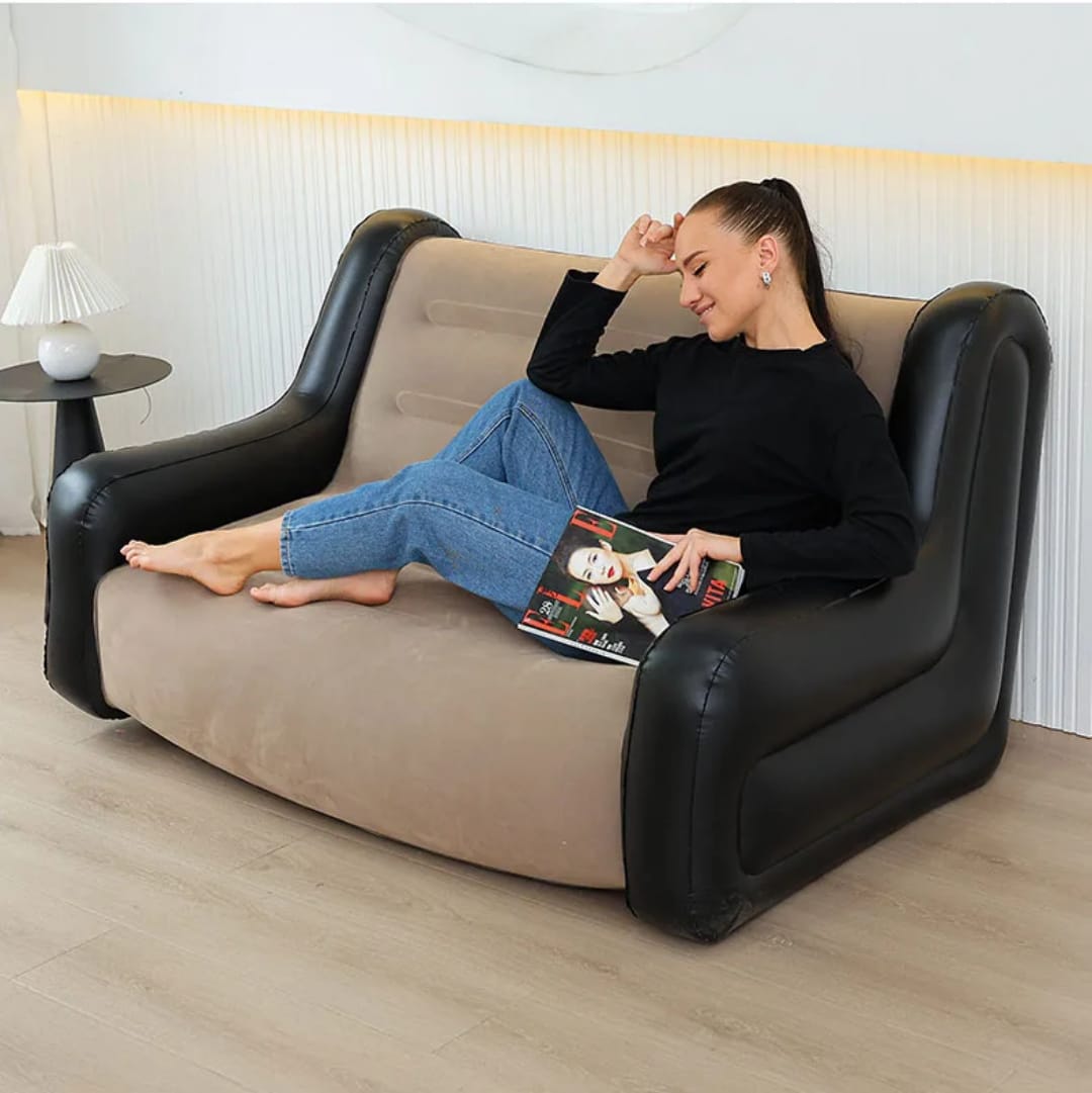 Inflatable two seater sofa with armrests, portable PVC design with free pump, suitable for indoor and outdoor use.