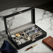 Portable organizer for storing 6 watches and 3 pairs of glasses.