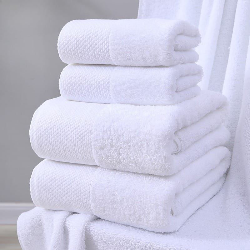 White hotel quality cotton bath towel set with bath, hand, and face towels
