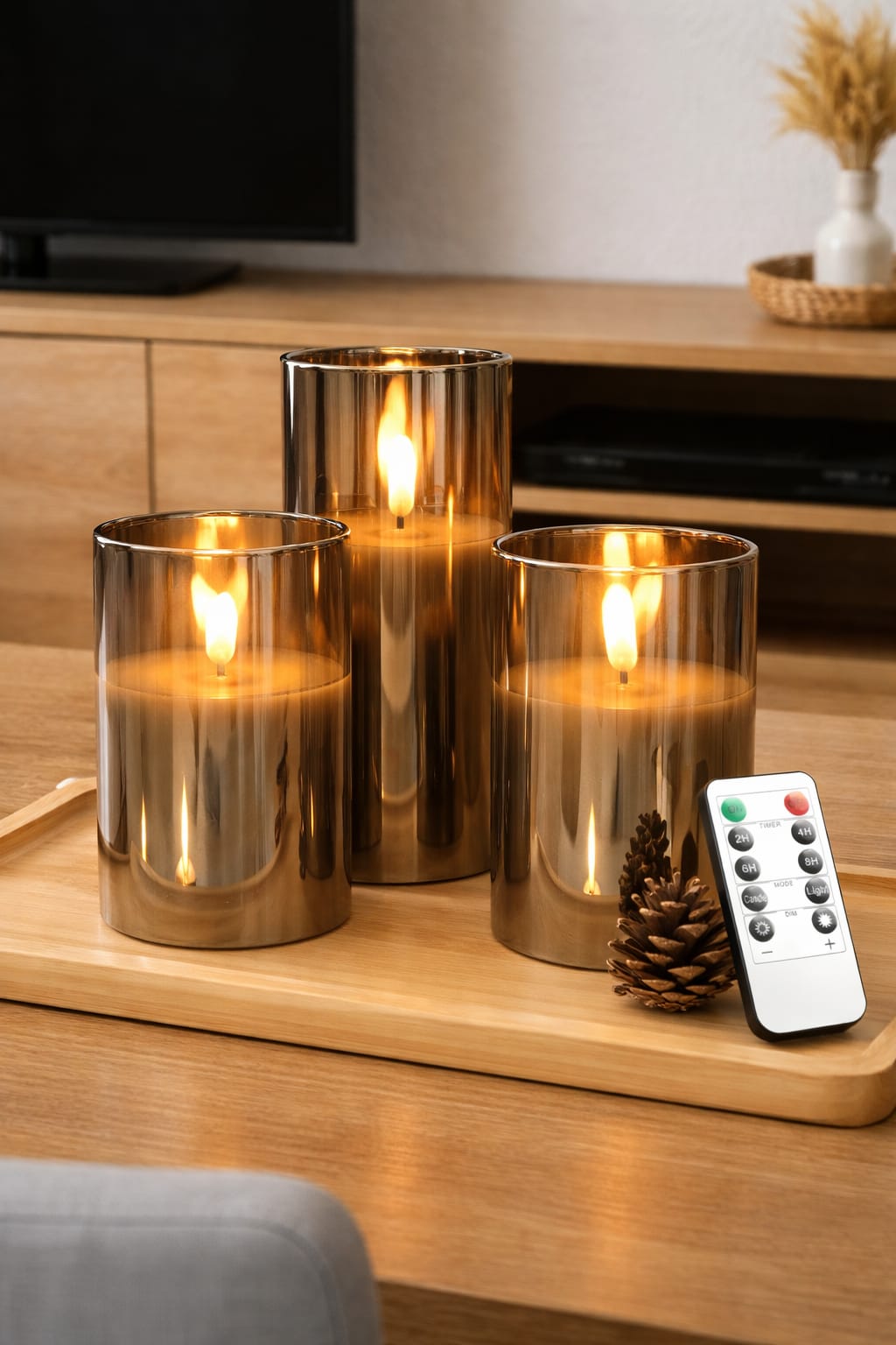 Set of three LED smokeless candles with remote control in gold and gray colors