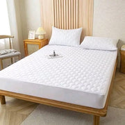 Quilted waterproof mattress protector for beds in 4by6, 5by6, and 6by6 sizes providing comfort and protection from spills and stains