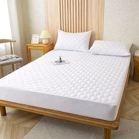 Quilted waterproof mattress protector for beds in 4by6, 5by6, and 6by6 sizes providing comfort and protection from spills and stains