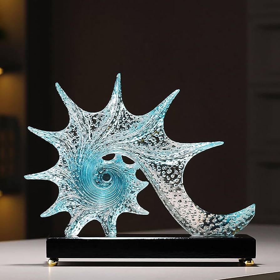 Dawood Lifestyle & Gadgets kes blue resin conch sculpture with starfish-inspired design, sparkling bubble texture, ocean blue gradient centre, and glossy black display base.