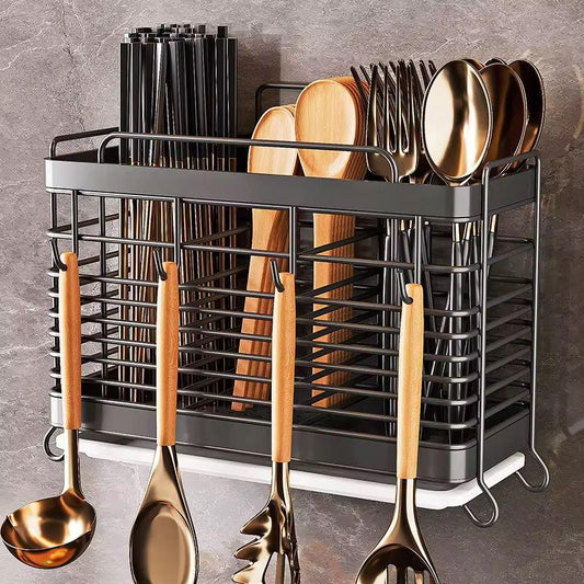 Wall-mounted stainless steel cutlery and knife storage rack.
