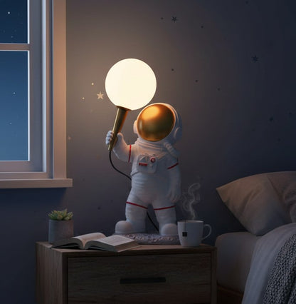 3D astronaut night lamp for kids emitting a soft warm glow, perfect for bedrooms and study areas