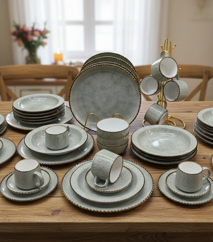 36-piece European porcelain dinner set with plates, bowls, mugs, and saucers.