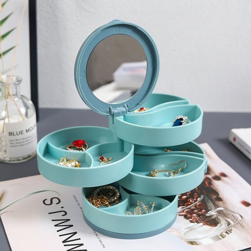 Four layer 360 rotating jewellery storage organizer in blue, pink, and white