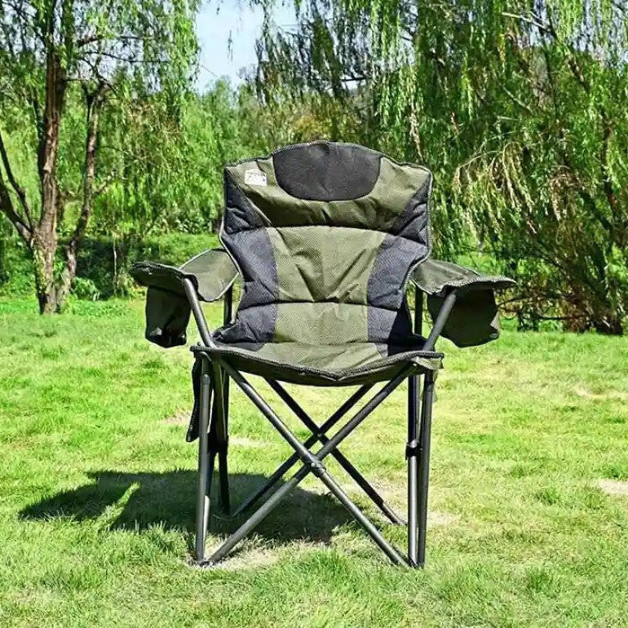 Portable heavy duty foldable camping chair with armrests, side pockets, and carrier bag for outdoor use.