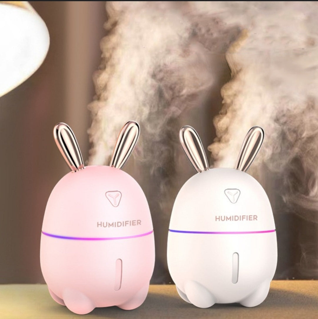 Pink and white cute rabbit mini USB humidifier with night light and 300ml tank.