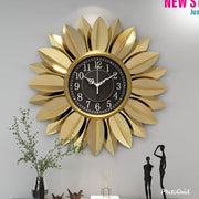 Handcrafted sunburst wall clock with artistic design for modern home and office wall décor.