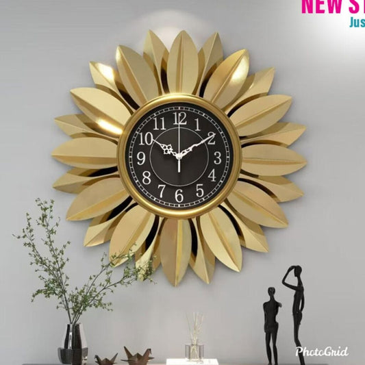 Handcrafted sunburst wall clock with artistic design for modern home and office wall décor.